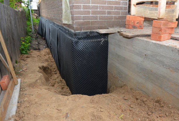 Happy homeowners after waterproofing job in Archbold